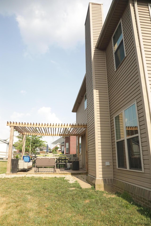 view of yard featuring a patio area and a pergola