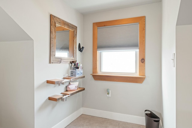 bathroom with baseboards