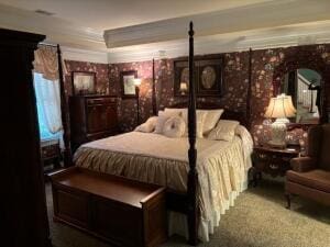 bedroom featuring ornamental molding