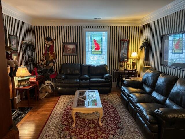 living room featuring wood finished floors and ornamental molding