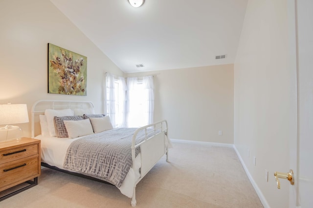 bedroom featuring visible vents, light carpet, baseboards, and vaulted ceiling