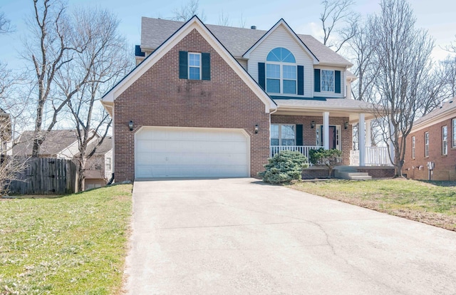 view of front facade with a front lawn, covered porch, concrete driveway, a garage, and brick siding