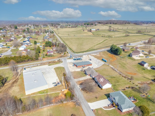 birds eye view of property featuring a rural view