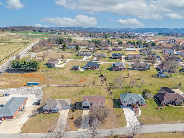 birds eye view of property with a residential view