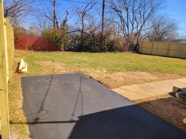 view of yard featuring fence