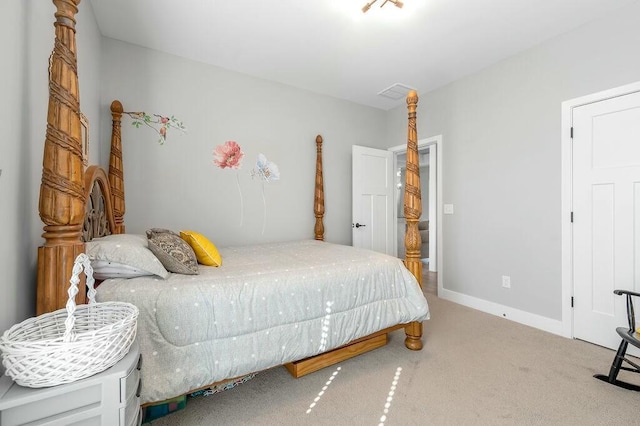 carpeted bedroom with baseboards