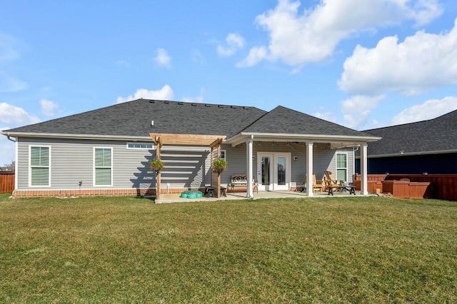 back of house with a patio, a jacuzzi, a yard, and french doors