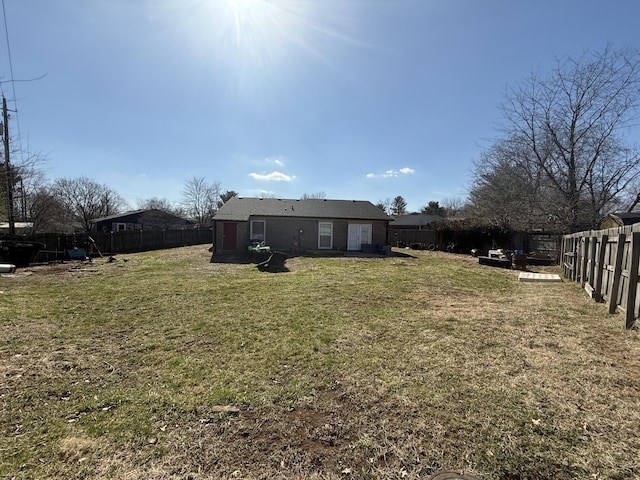 view of yard featuring a fenced backyard