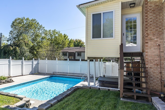 view of pool featuring a patio, stairway, a fenced backyard, and a fenced in pool