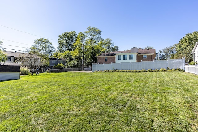 view of yard featuring fence