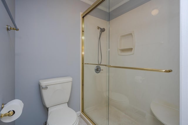 full bathroom with a stall shower and toilet