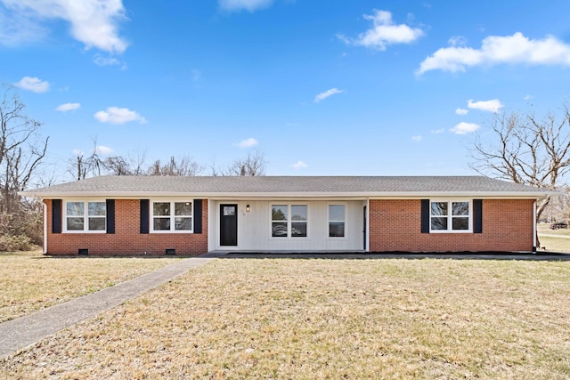 ranch-style home featuring a front lawn, brick siding, roof with shingles, and crawl space