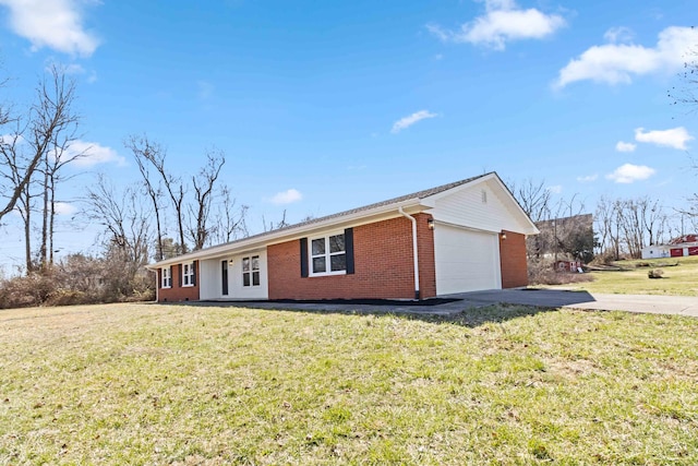 ranch-style house with a garage, a front lawn, concrete driveway, and brick siding