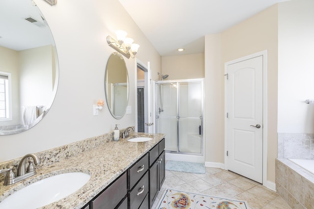 full bathroom with tile patterned flooring, a shower stall, visible vents, and a sink