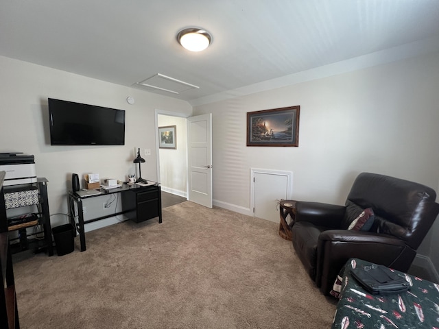 living room with carpet and attic access