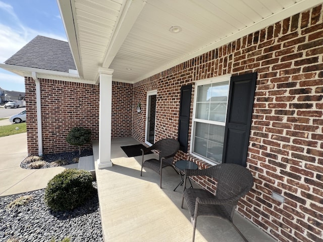 view of patio featuring a porch