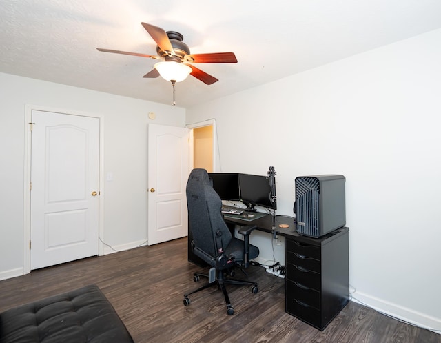 office area featuring baseboards, a ceiling fan, and wood finished floors