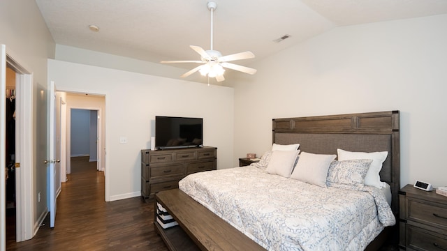 bedroom featuring a ceiling fan, visible vents, baseboards, dark wood finished floors, and lofted ceiling