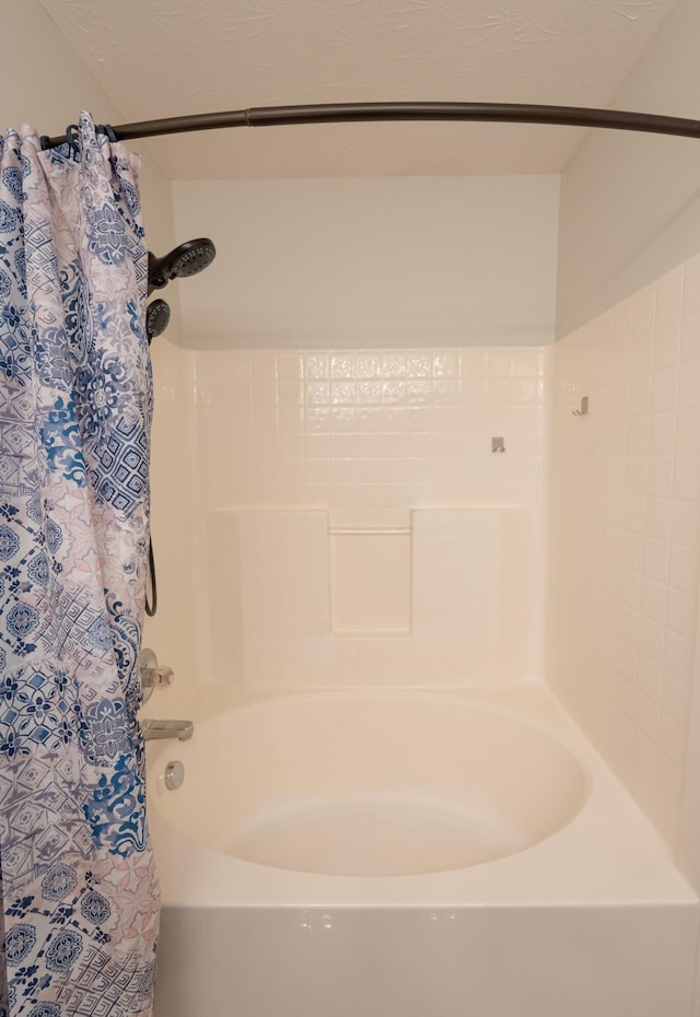 full bathroom featuring shower / tub combo with curtain