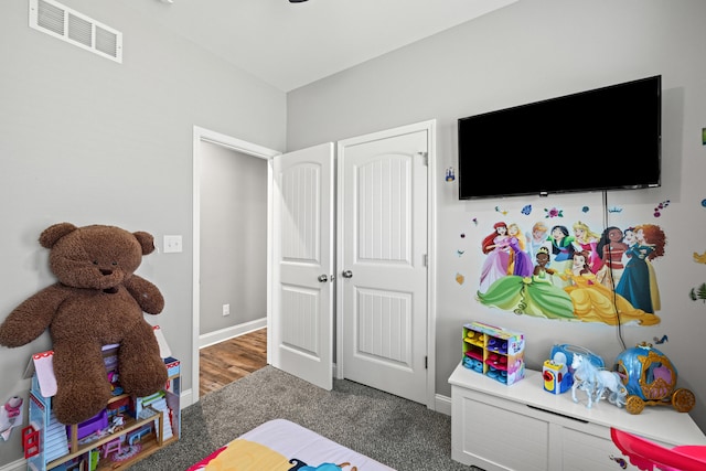 game room featuring carpet flooring, baseboards, and visible vents