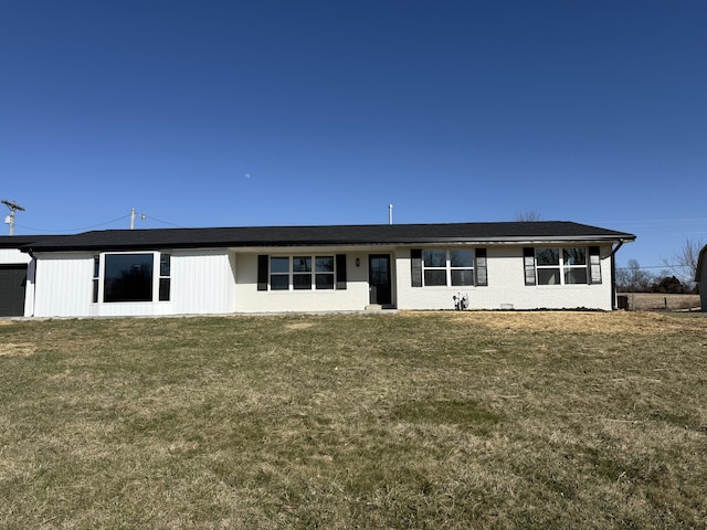 view of front of property with a front lawn