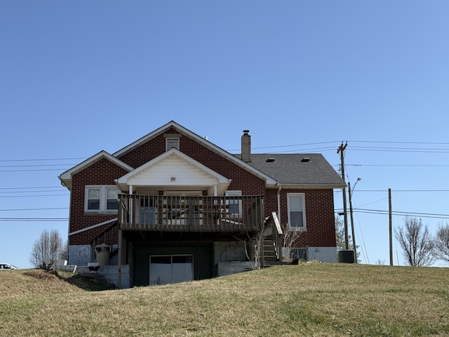 rear view of house featuring central air condition unit, a yard, stairway, brick siding, and a chimney