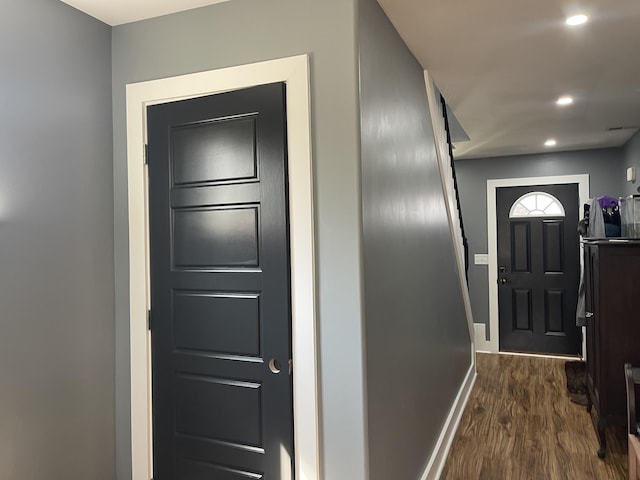 entryway featuring recessed lighting, baseboards, and dark wood finished floors