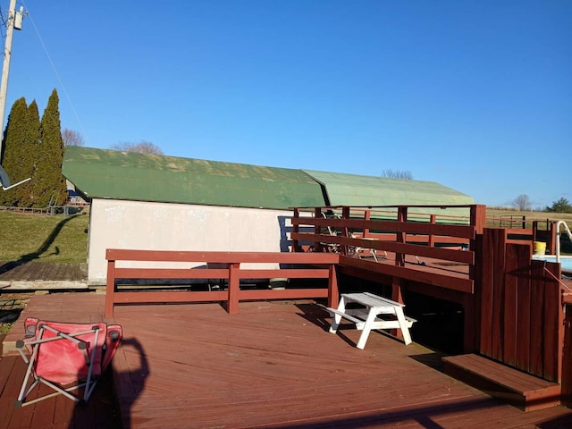 view of dock featuring a wooden deck