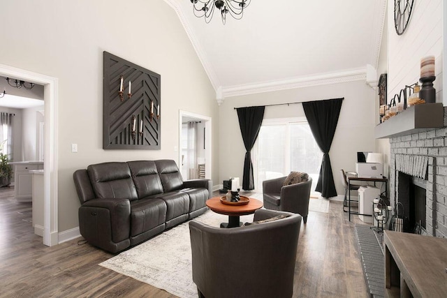 living area featuring wood finished floors, high vaulted ceiling, ornamental molding, and a fireplace