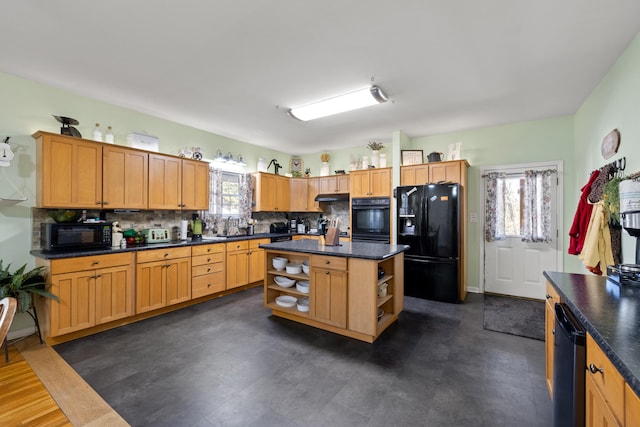 kitchen with dark countertops, a healthy amount of sunlight, black appliances, and open shelves