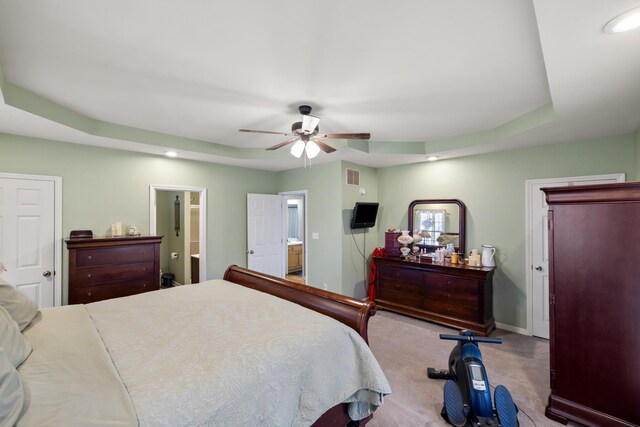 carpeted bedroom featuring visible vents, baseboards, ceiling fan, recessed lighting, and ensuite bathroom