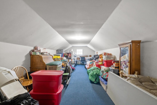 bonus room with lofted ceiling and carpet