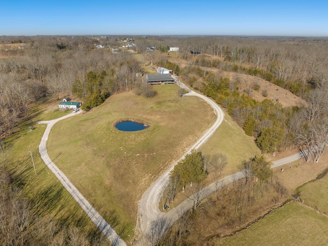 birds eye view of property featuring a rural view