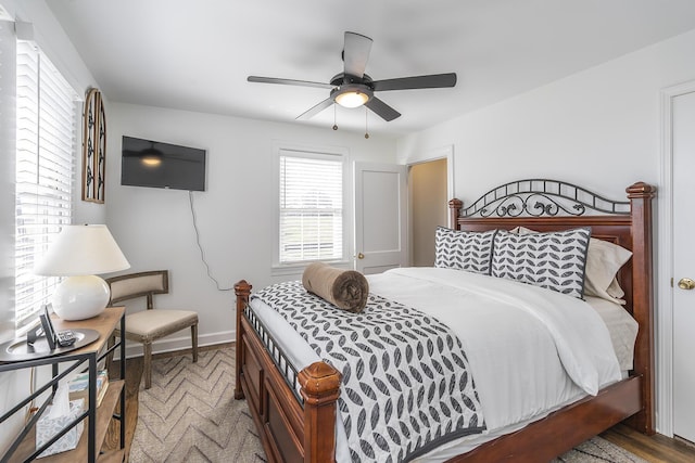 bedroom with baseboards and ceiling fan