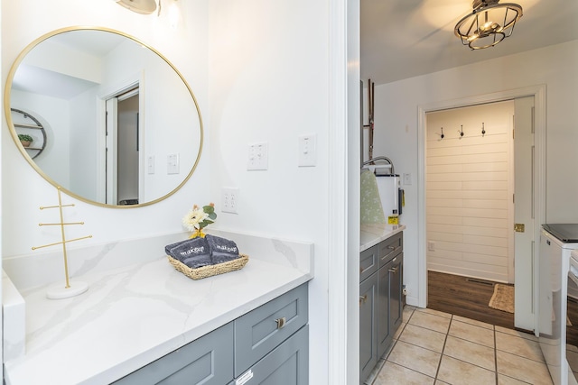 bathroom with vanity and tile patterned flooring