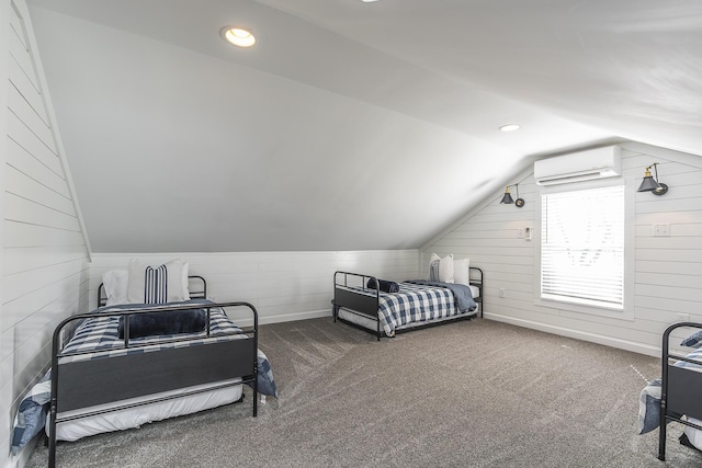 carpeted bedroom with a wall mounted air conditioner, wooden walls, recessed lighting, and vaulted ceiling