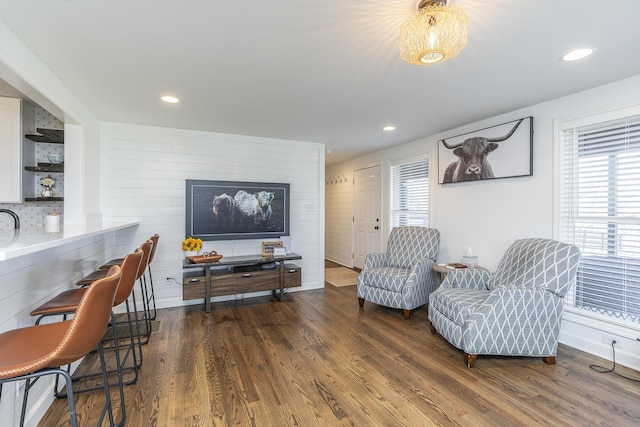 living room with recessed lighting and wood finished floors