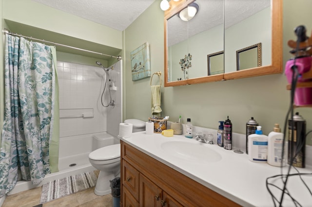 full bath featuring vanity, a shower with curtain, a textured ceiling, tile patterned floors, and toilet