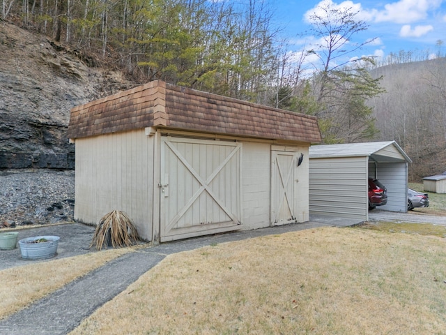 view of shed featuring a detached carport