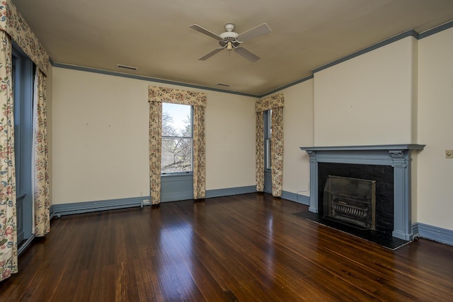 unfurnished living room featuring visible vents, a fireplace with flush hearth, ornamental molding, ceiling fan, and hardwood / wood-style flooring