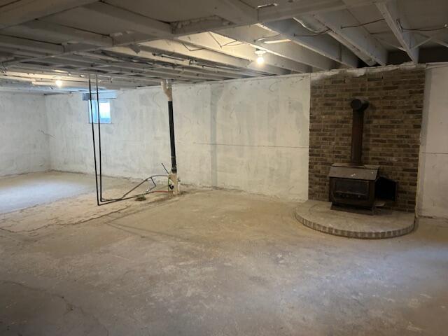 basement with a wood stove