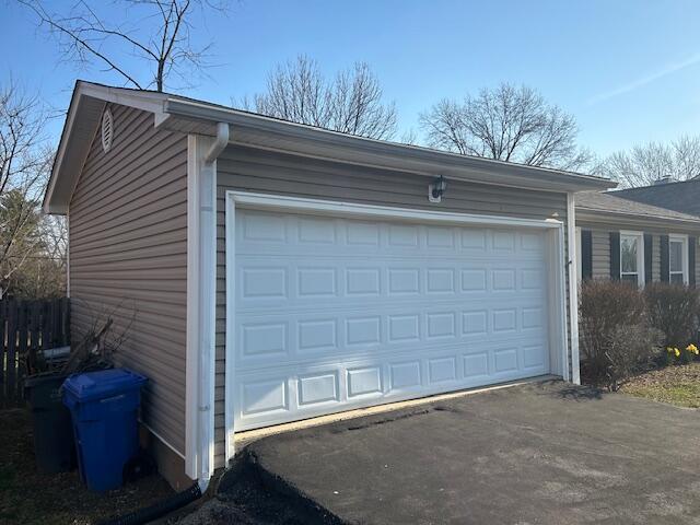 garage featuring driveway