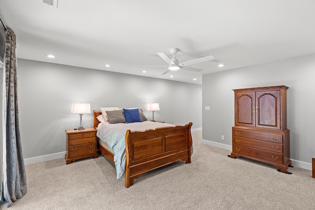 bedroom featuring recessed lighting, baseboards, light carpet, and a ceiling fan