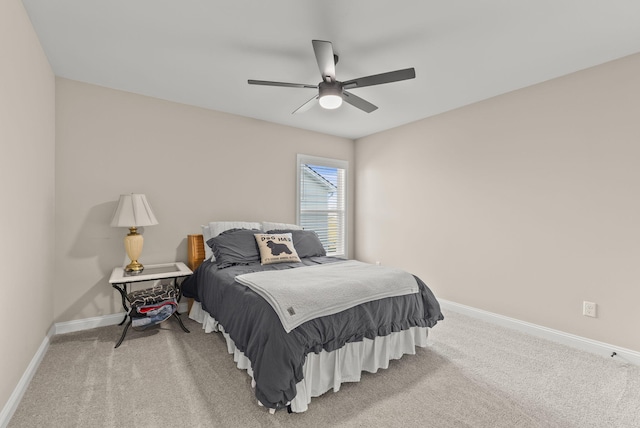 bedroom featuring baseboards, carpet, and a ceiling fan