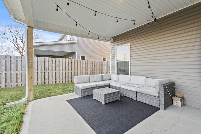 view of patio with outdoor lounge area and fence