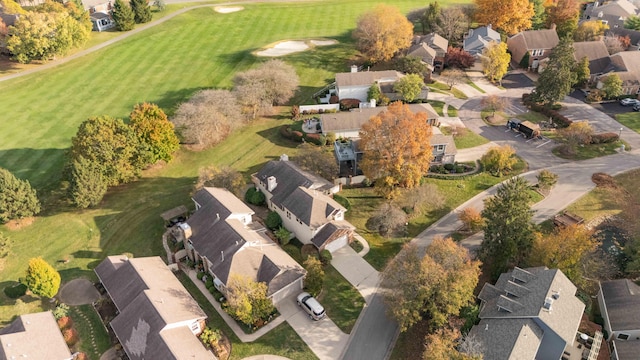 birds eye view of property with a residential view