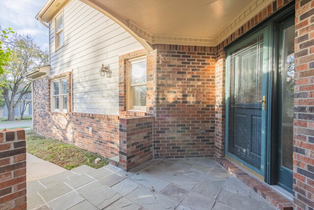 empty room with light wood-style flooring and baseboards