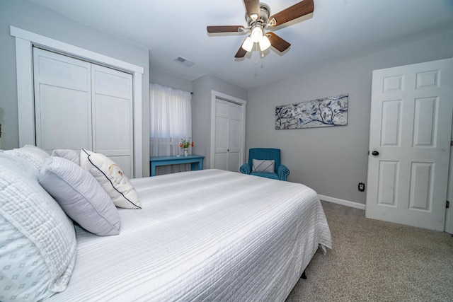 285 Hill Rd, Somerset, KY 42501 - bedroom with visible vents, multiple closets, carpet flooring, baseboards, and ceiling fan