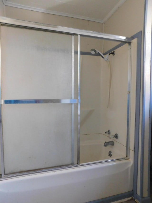 full bathroom with combined bath / shower with glass door