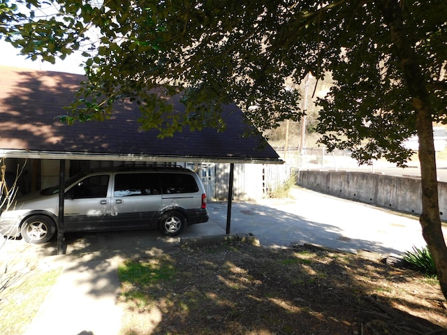 exterior space featuring a carport